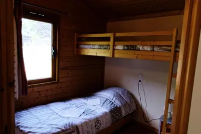 Un ou plusieurs lits dans un hébergement de l'établissement Gîte de France Chalet n°2 - Gîte de France 4 personnes MAE-6644