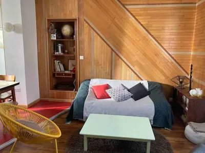 Coin salon dans l'établissement Maison centre hyper calme au vert