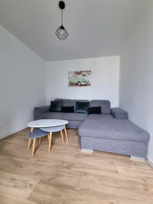 Coin salon dans l'établissement Gîte 6 personnes Chez Max