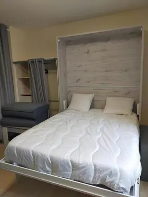 Un ou plusieurs lits dans un hébergement de l'établissement Studio 2 - Mont Dore face aux Thermes - Hyper-Centre