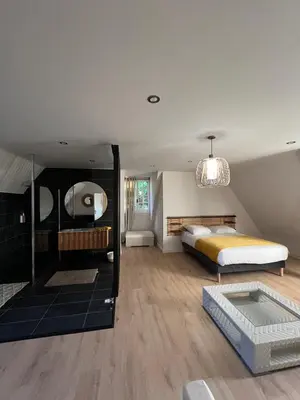 Un ou plusieurs lits dans un hébergement de l'établissement Maison de caractère rénové pour 15 personnes