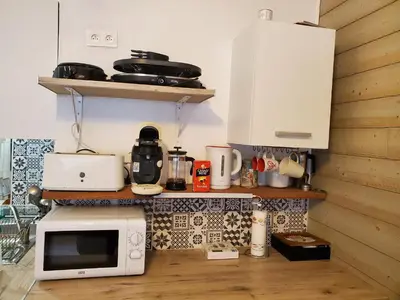 Cuisine ou kitchenette dans l'établissement Studio à Super Besse 800m des pistes