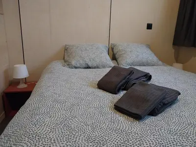 Un ou plusieurs lits dans un hébergement de l'établissement Chalet le Dôme