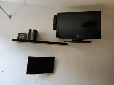 Télévision ou salle de divertissement dans l'établissement Super-Besse - studio 800m des pistes