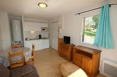 Télévision ou salle de divertissement dans l'établissement Gîte du bosquet