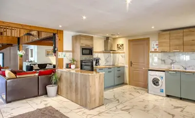 Cuisine ou kitchenette dans l'établissement Le Paradis