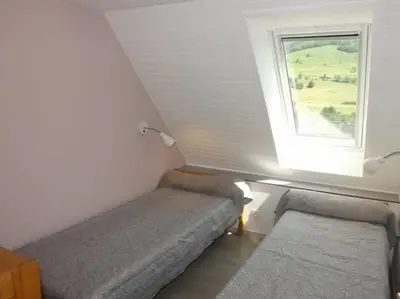 Coin salon dans l'établissement Gite 7 Séjour au Puy Mary Gîte Confortable pour des Vacances Inoubliables
