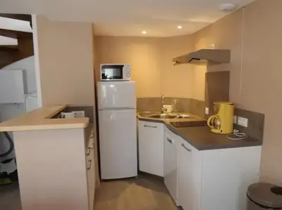 Cuisine ou kitchenette dans l'établissement Gîte 18 Confortable au Pied du Puy Mary 4-6 Pers