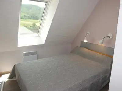 Un ou plusieurs lits dans un hébergement de l'établissement Gite 1 Gîte 7-9 Pers Puy Mary - Confort & Nature en Auvergne