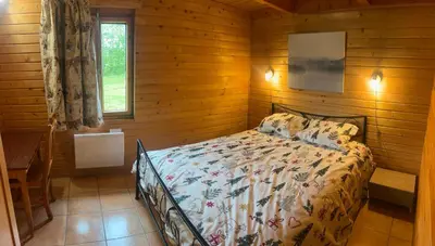Un ou plusieurs lits dans un hébergement de l'établissement Chalet de l empereur