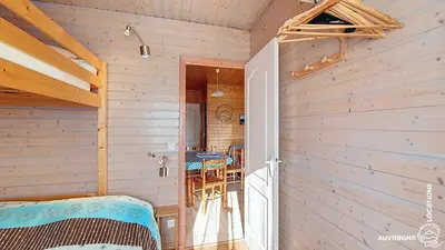 Un ou plusieurs lits dans un hébergement de l'établissement Chalet de la Gougère 3