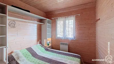 Un ou plusieurs lits dans un hébergement de l'établissement Chalet de la Gougère 4