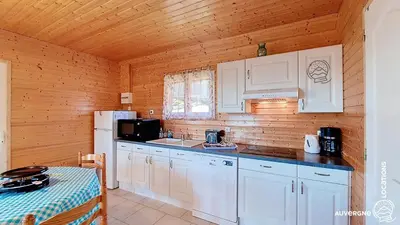 Cuisine ou kitchenette dans l'établissement Chalet de la Gougère 4