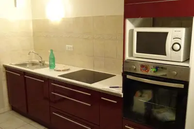 Cuisine ou kitchenette dans l'établissement appart meublé fontanille