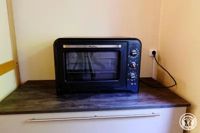 Télévision ou salle de divertissement dans l'établissement Gite ecole 4